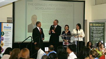 Jonathon Romero receives the Gerald J. Meyer Transfer Scholarship Award. from Dr. Meyer, Ms. Santos and Dr. Rivera