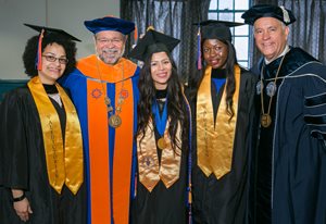 Chancellor and President with students