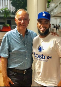 Chancellor with Hostos graduate